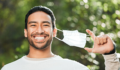 Buy stock photo Man, face mask and forest with smile, portrait and freedom for wellness, health and breathing in sunshine. Asian guy, covid ppe and excited for medical protection, immune system and outdoor in woods