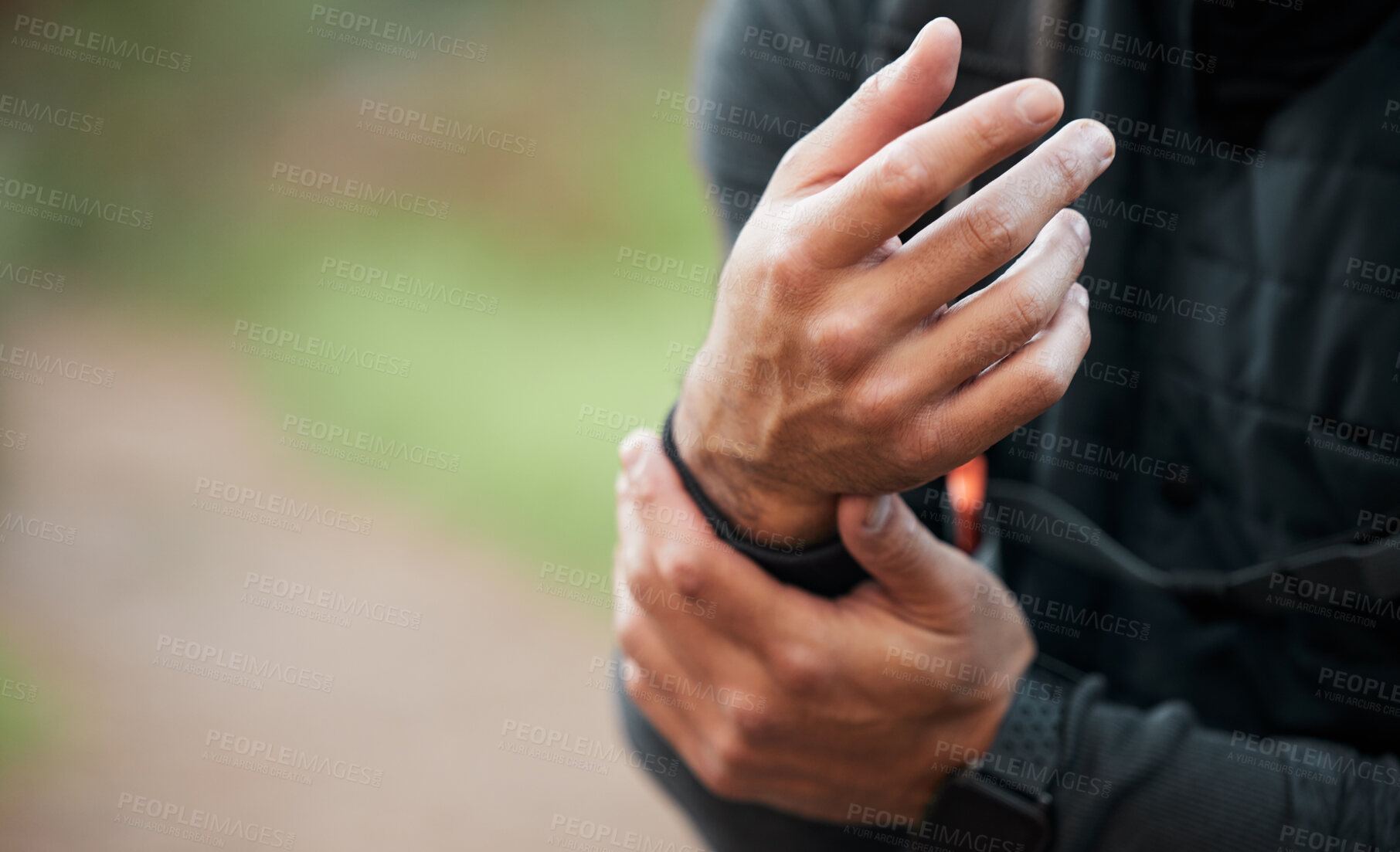 Buy stock photo Wrist, pain and hands of man in sports, outdoor and training with a medical accident, crisis or problem with anatomy in nature. Exercise, injury and athlete with trauma to muscle, joint or hand 