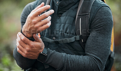 Buy stock photo Wrist, pain and hands of man hiking, outdoor and exercise with a medical accident, crisis or problem with anatomy in nature. Training, injury and athlete with trauma to muscle, joint or hand 