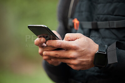 Buy stock photo Closeup, man or athlete with a smartphone, typing or social media with mobile user, tracking progress or contact. Person, runner or hands with digital app, cellphone or break with exercise or network