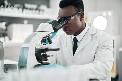 Buy stock photo Microscope, black man or biotechnology with research, medical or data analysis with experiment. African person, scientist or researcher with laboratory equipment, testing sample or dna with pathology