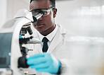 Microscope, black man and chemistry with research, medical and experiment with biotechnology. African person, science and researcher with laboratory equipment, healthcare and check vaccine results