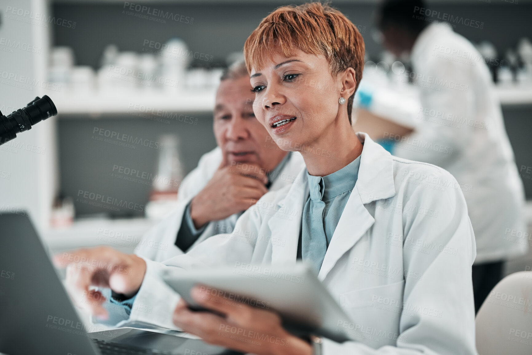 Buy stock photo Science, teamwork and discussion on laptop in laboratory to research solution, investigation and review medical data. Scientist, woman and planning digital results, biotechnology and info on computer