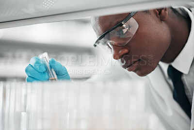 Buy stock photo Man, test tube and science research in laboratory for medical investigation, innovation and vaccine development. African scientist, chemistry and planning analysis for medicine, dna results or sample