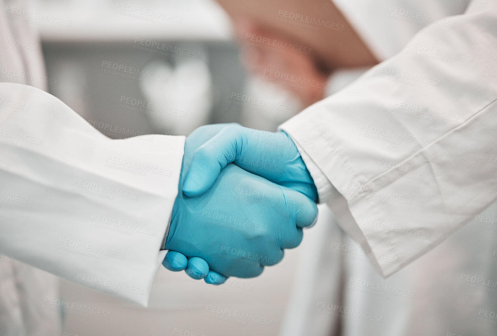 Buy stock photo Closeup, medical and research with handshake, people and agreement with promotion, cooperation and partnership. Teamwork, scientists and staff shaking hands, welcome and gloves with collaboration