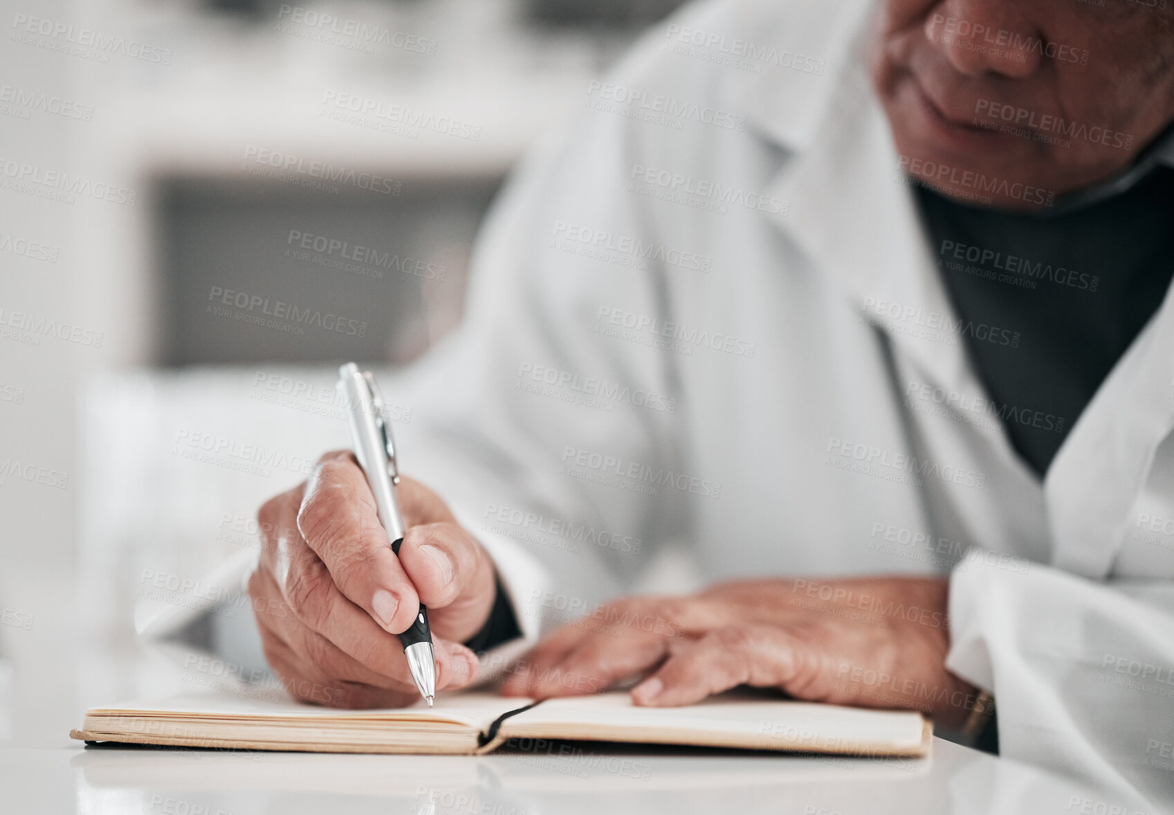 Buy stock photo Scientist, writing and planning in notebook for healthcare research, data analysis and goals. vaccine solution or ideas. Hands of science person or doctor for laboratory notes or medical information