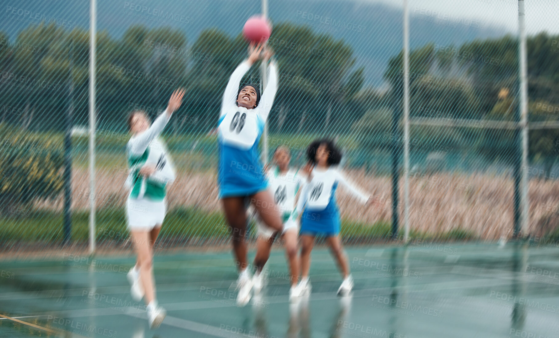 Buy stock photo Sports, team and netball with woman jump for ball, competition and athlete playing game, court challenge or active match. Motion blur, action and group workout, exercise and player training together