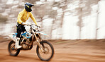 Bike, speed and motion blur with a sports man on space in the forest for dirt biking. Motorcycle, fitness and power with a person driving fast on an off road course for freedom or performance