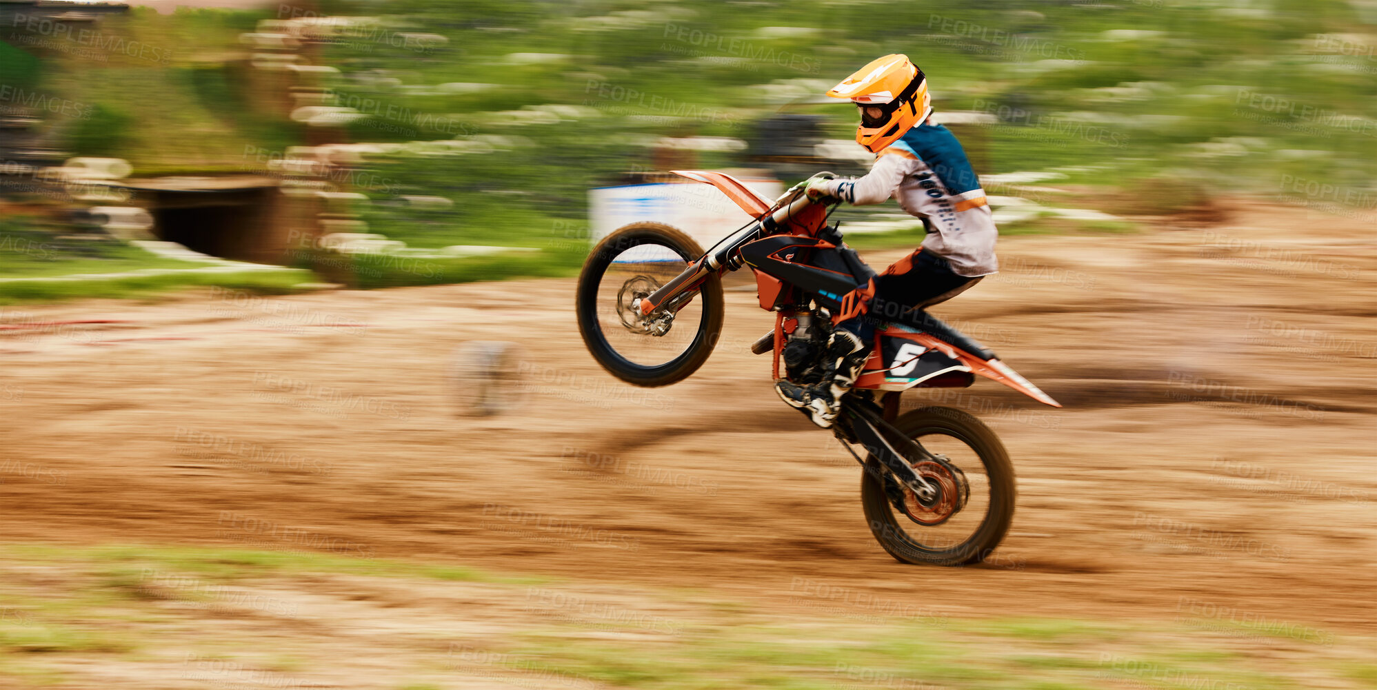 Buy stock photo Motorcycle, balance and motion blur with a man at a race on space in the forest for dirt biking. Bike, fitness and power with a sports person driving fast on an off road course for freedom or speed