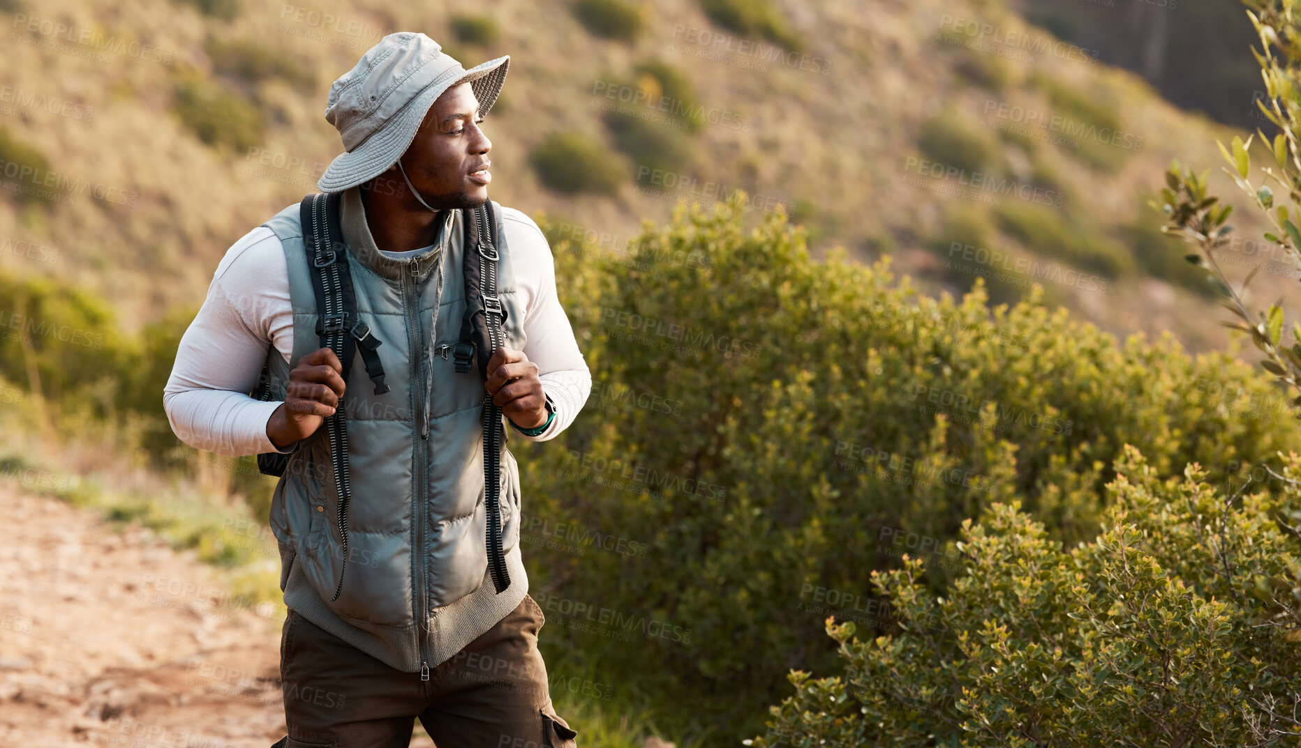 Buy stock photo Hiking, thinking or black man in nature, forest or wilderness for trekking journey or adventure for freedom. Bush, holiday or African hiker walking in park or woods for exercise, fitness or wellness