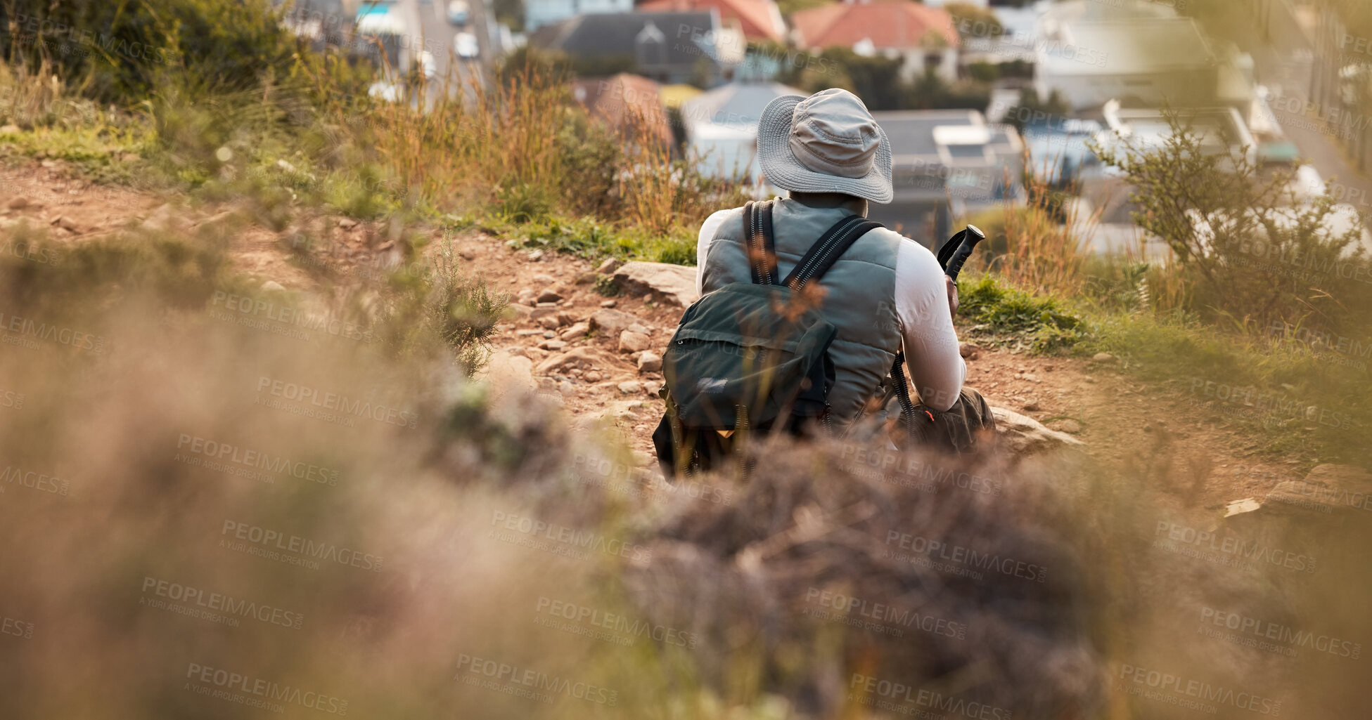 Buy stock photo Back, relax and view with a man hiking on mountain terrain for travel, freedom or adventure in a remote location. Hike, rest and scenic with a backpacker or hiker outdoor in nature to explore