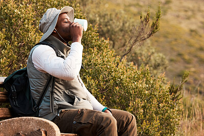 Buy stock photo Black man, coffee or hiker hiking in a forest, nature or woods outdoors in adventure or bench to relax. Tea, fitness or thirsty African person trekking or walking on a journey refreshing on break