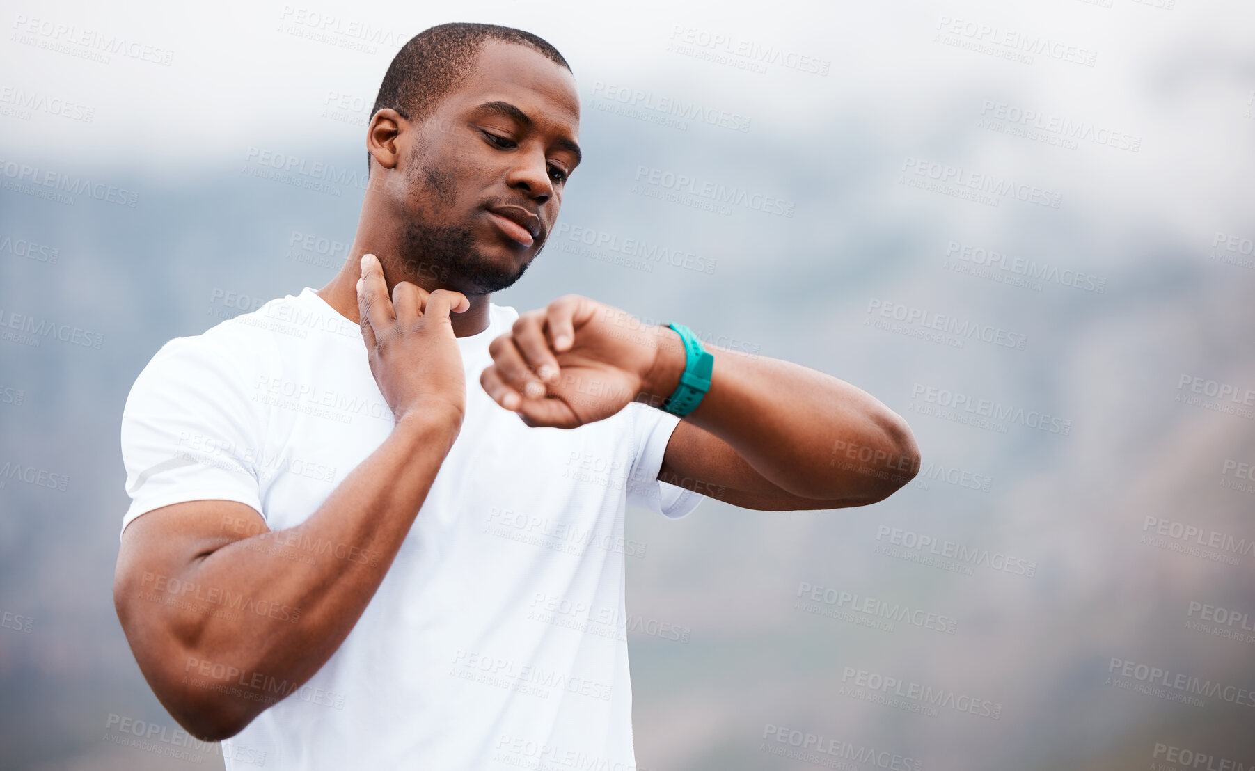 Buy stock photo Fitness, watch and pulse with a black man hiking in the forest for health, wellness or cardio on space. Exercise, time and heart rate with a young athlete in the mountains or nature for running