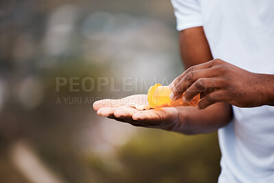 Buy stock photo Pills, space and medicine with hands of person in nature for healthcare, pharmacy and supplements. Vitamins, medical and wellness with closeup of man and medication for antibiotics and mockup