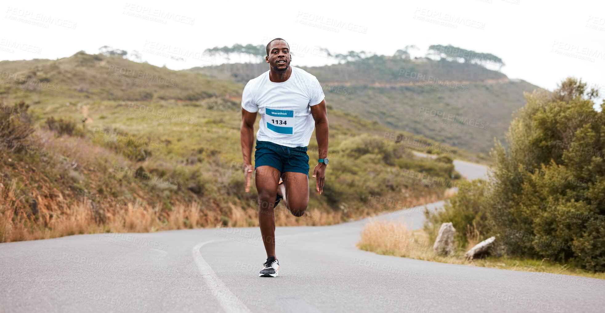 Buy stock photo Fitness, running and and man in a road for marathon, sports and training, morning or cardio routine. Runner, workout and African male athlete in street with energy, exercise or resilience performance