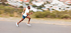 Speed, road and a black man running for fitness, exercise and training for a marathon. Sports, health and an African runner or fast person in the street for a workout, cardio or athlete commitment