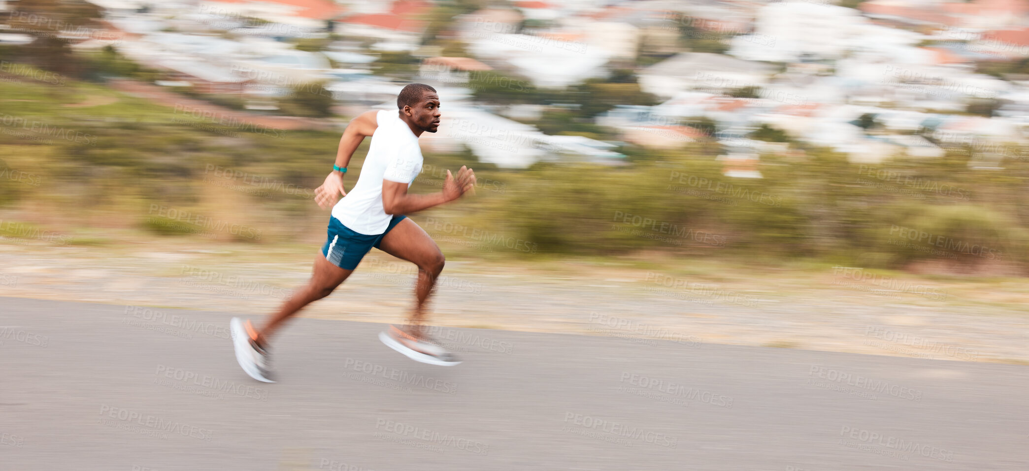 Buy stock photo Speed, road and a black man running for fitness, exercise and training for a marathon. Sports, health and an African runner or fast person in the street for a workout, cardio or athlete commitment