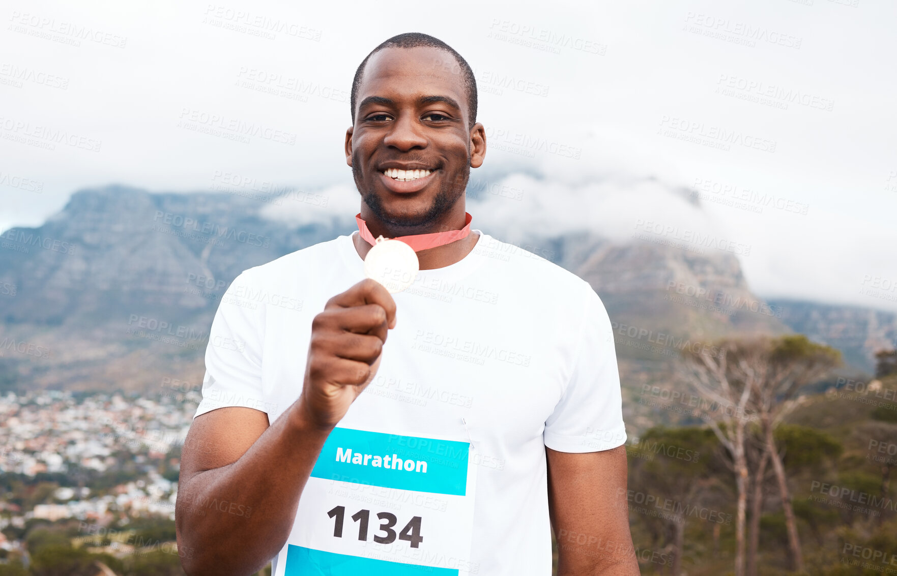 Buy stock photo Runner man, winner and medal in portrait for marathon, competition or race with smile in Cape Town. African athlete guy, champion and success in challenge, contest and happy for metal prize in nature