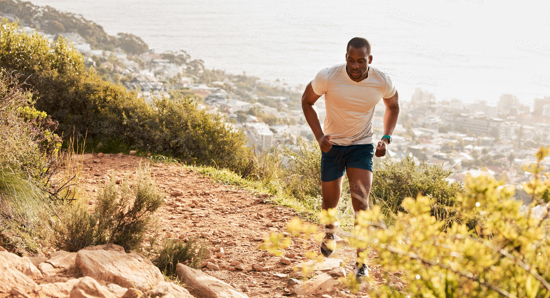 Buy stock photo Fitness, hill or runner running on mountain by nature for exercise, training or outdoor workout. Sports race, fast black man or healthy active athlete on trail with endurance, freedom or challenge