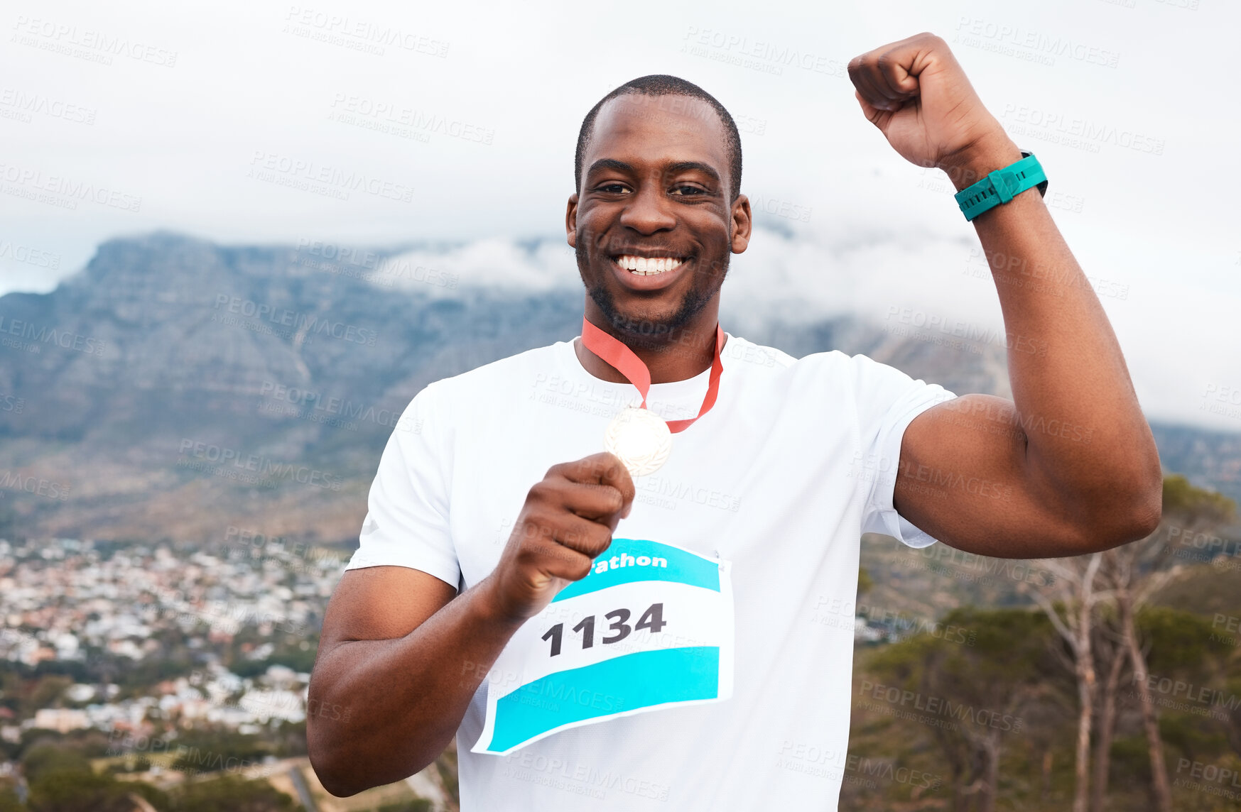 Buy stock photo Runner man, celebration and medal in portrait for marathon, competition or race with smile in Cape Town. African winner guy, champion and goal in challenge, contest or fist for metal prize in nature