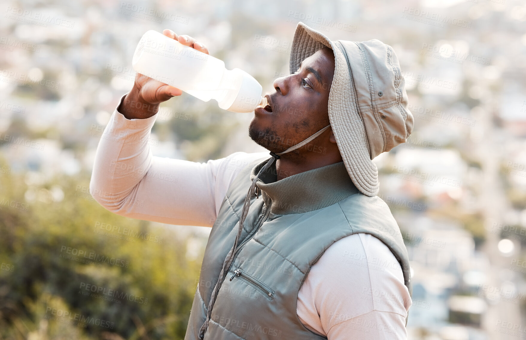 Buy stock photo Hiking, drinking water and black man with fitness, health or hydration with workout, peace or exercise. African person, travel or hiker with bottle for liquid, thirsty or nature with wellness or aqua