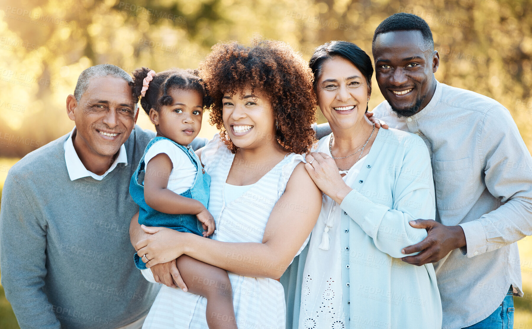 Buy stock photo Smile, portrait and child with grandparents and parents in an outdoor park for adventure, holiday or weekend trip. Happy, excited and family generations bonding and having fun in nature in a field.