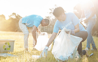 Buy stock photo Nature recycling, community service volunteer and woman cleaning garbage, grass field trash or plastic pollution. Earth Day cooperation, eco project and charity team help with product clean up