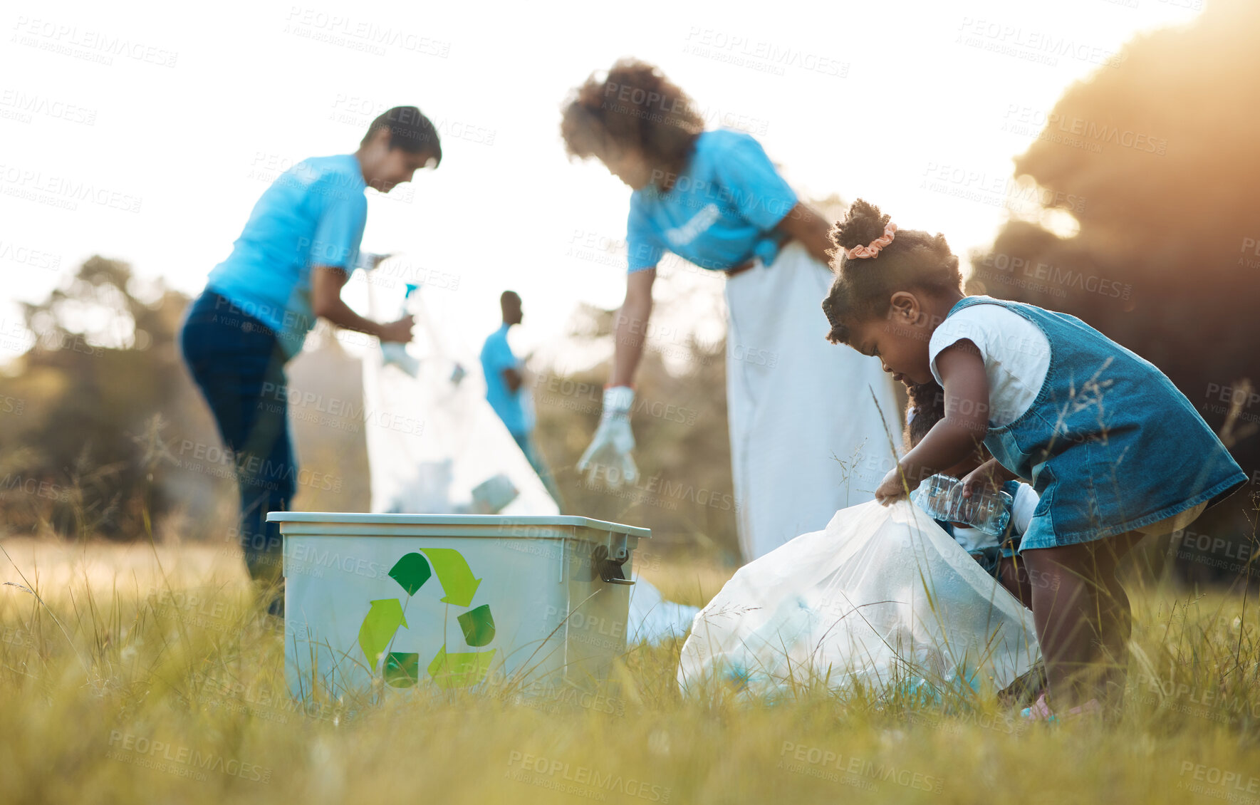 Buy stock photo Nature, community service and family recycle, cleaning garbage pollution and support environment, volunteering or help. People teamwork, child and plastic clean up, charity project or recycling trash