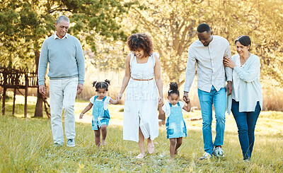 Buy stock photo Nature, walking and children with parents and grandparents in a park for bonding, having fun and talking together. Happy, smile and family generations in an outdoor green garden on a weekend trip.