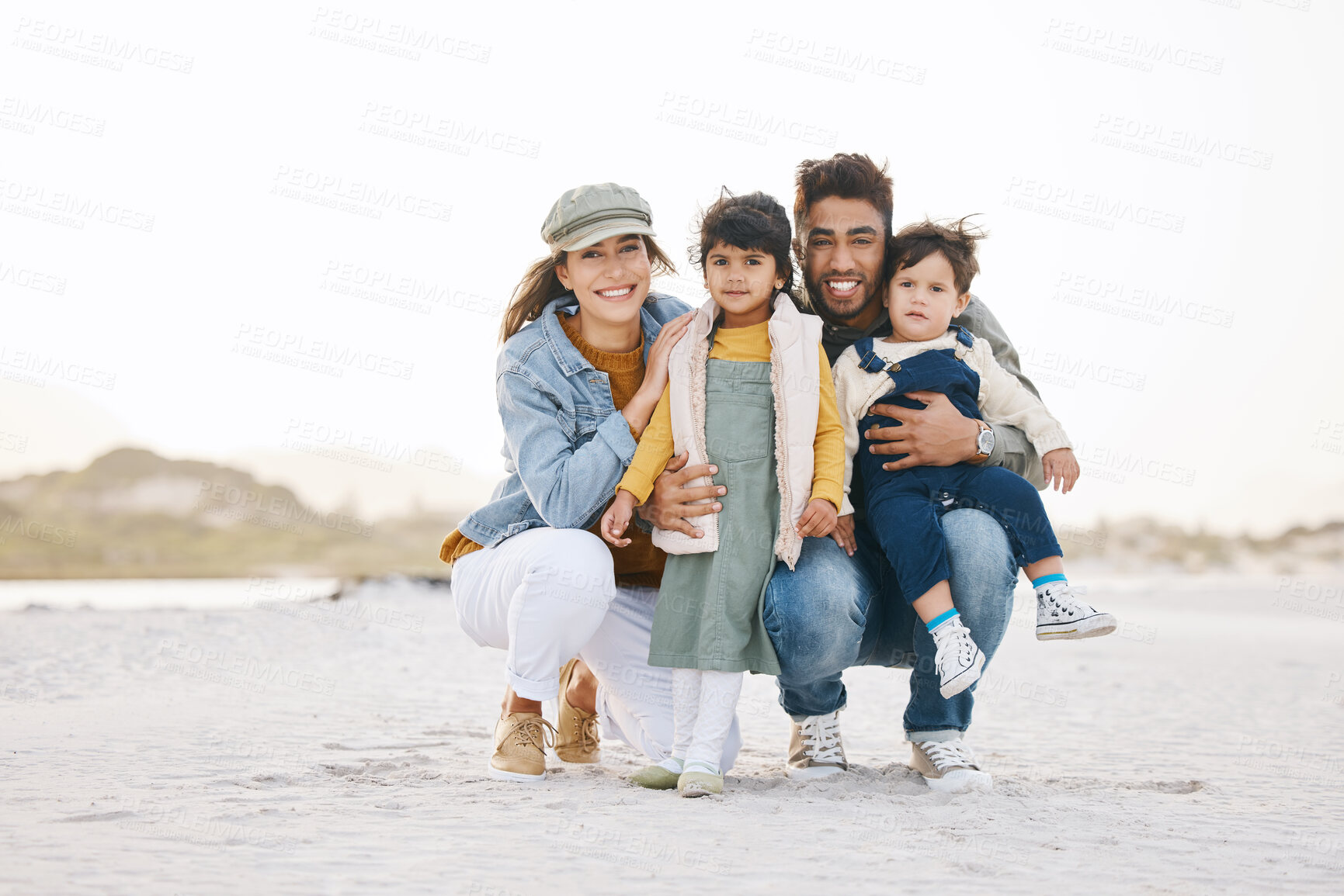Buy stock photo Happy family, portrait and children with parents on beach, vacation or travel to Rio de Janeiro with happiness or freedom. Face, smile and young kids with mom and dad in summer, holiday or nature 