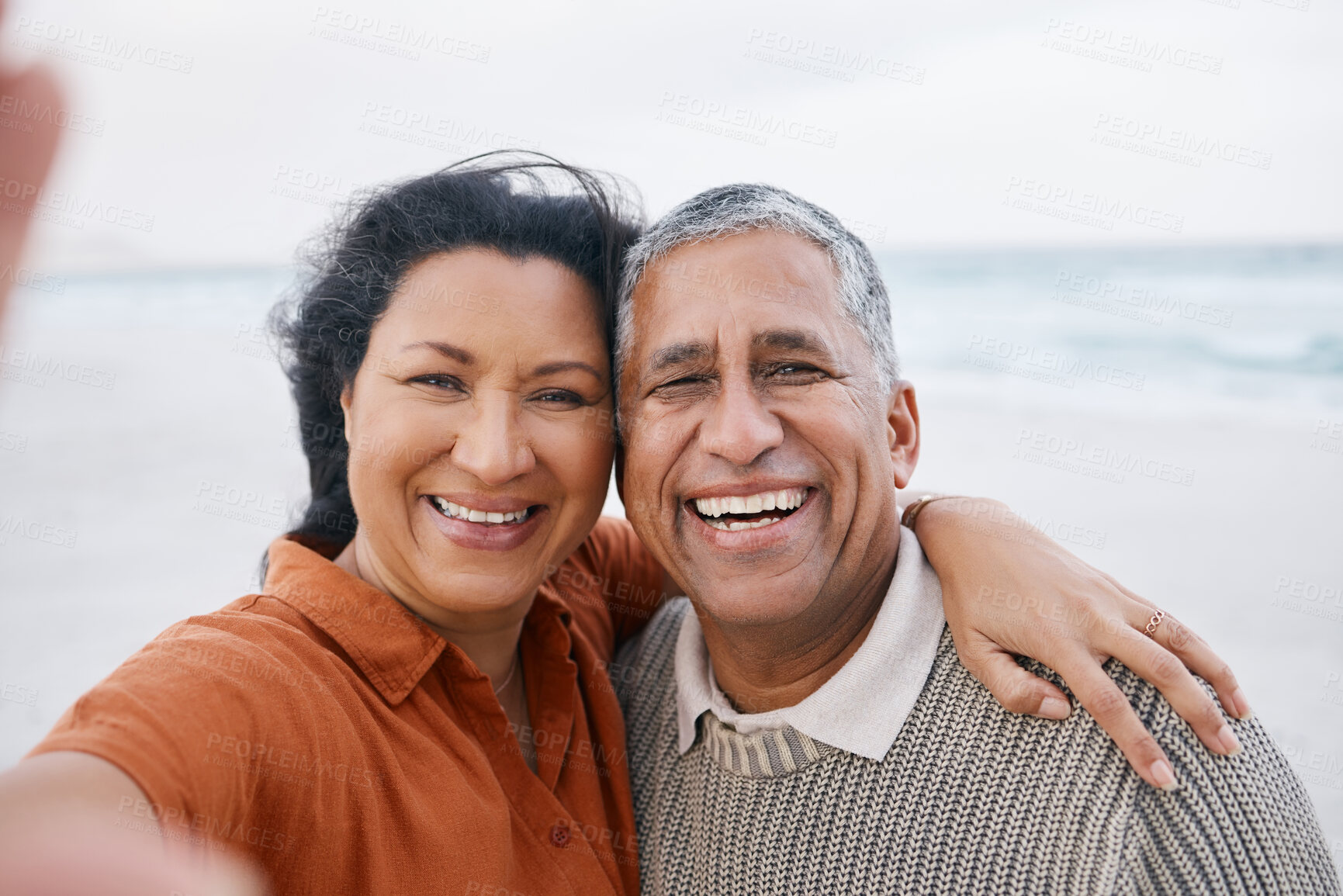 Buy stock photo Ocean, senior or selfie portrait of happy couple with love, smile or support for a romantic bond together. Beach, old man or elderly woman taking photograph or picture memory in retirement in nature