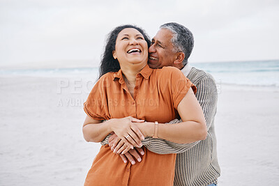 Buy stock photo Beach, hug and senior couple laugh at funny conversation, nature joke or travel holiday humour. Tropical date, comedy and romantic elderly man, old woman or marriage people bonding, hugging and care