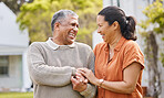 Love, happy and laughing with old couple holding hands for support, romance or bonding. Retirement, smile and marriage with senior man and woman in backyard of home for relationship, care and relax