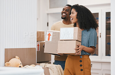 Buy stock photo Excited black couple, box and moving in new home, investment or property together in happiness. African man and woman smile with boxes in renovation, relocation or house mortgage and apartment loan