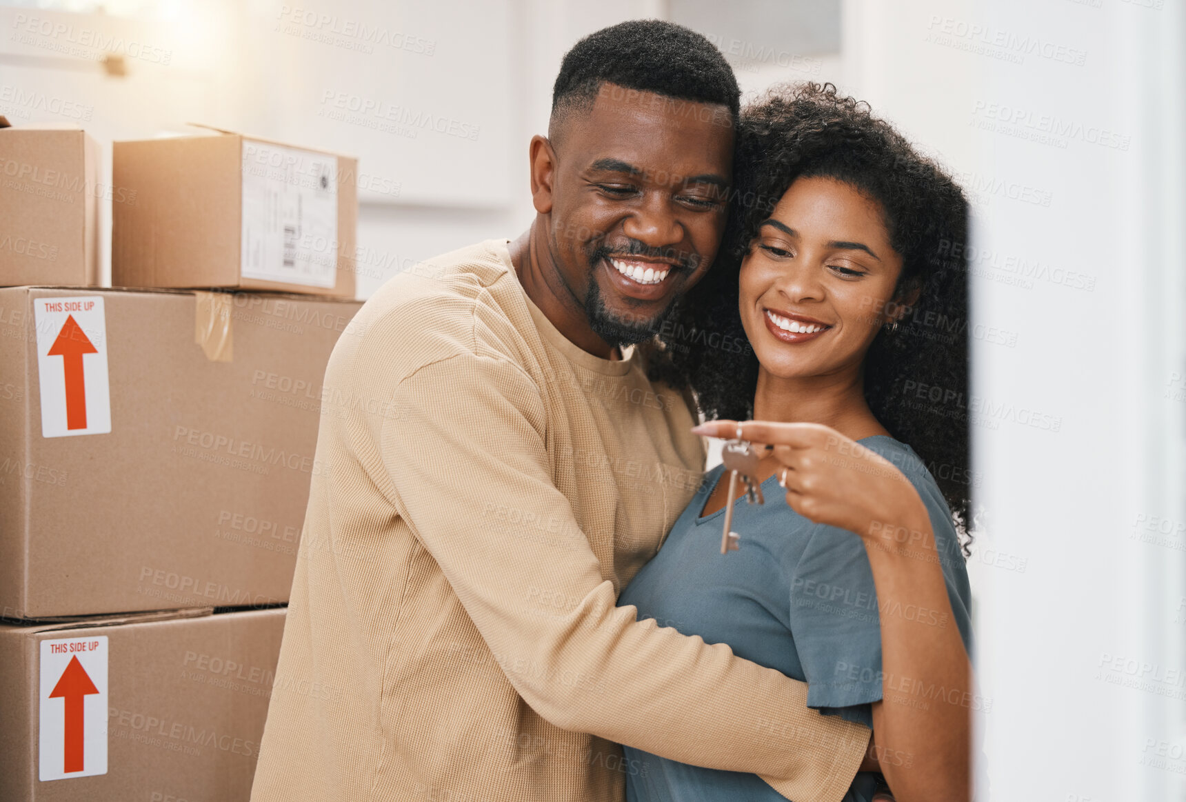 Buy stock photo Happy black couple, keys and real estate for new home, property or investment in goals or mortgage together. Excited man and woman holding access to house, apartment or building for room or rent