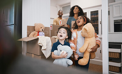 Buy stock photo Family, moving and living room with kids, father and love together in a new home with toys. Mother, youth and children with dad and cardboard boxes with help, laugh and care in a house with a smile