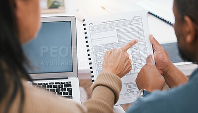 Buy stock photo Hands, insurance documents and couple reading with laptop, pointing and financial decision in home. Man, woman and application by computer, planning or talk for budget, premium or safety for property