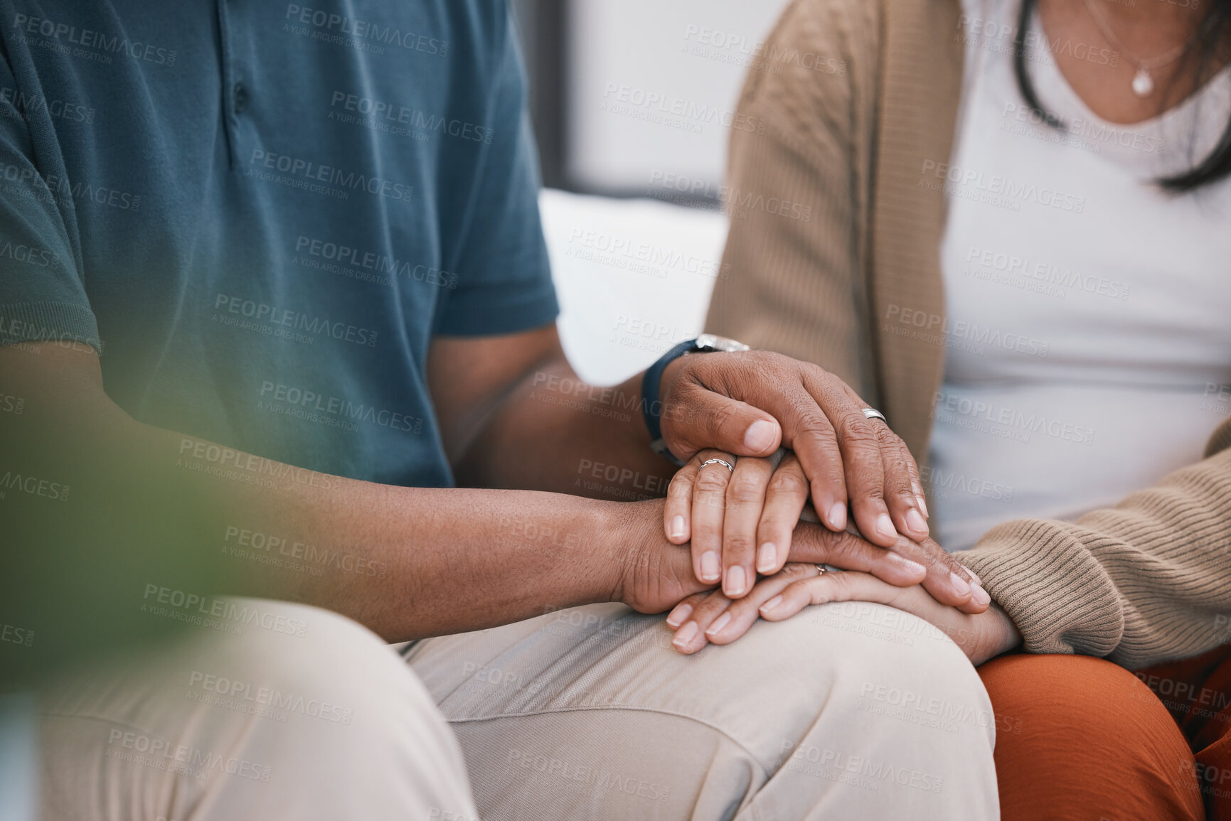 Buy stock photo Support, love and couple holding hands closeup with hope, trust and kindness at home. Empathy, zoom and man with woman in a living room with comfort, trust and understanding in infertility crisis