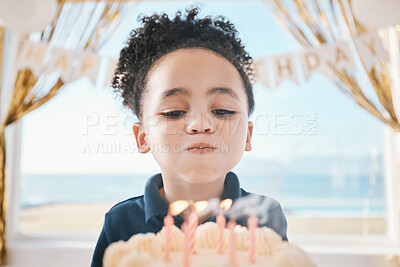 Buy stock photo Cake, face and girl child blowing candles at birthday, celebration or special event in her home. Party, dessert and kid with wish, playful and excited in a living room for social gathering or eating