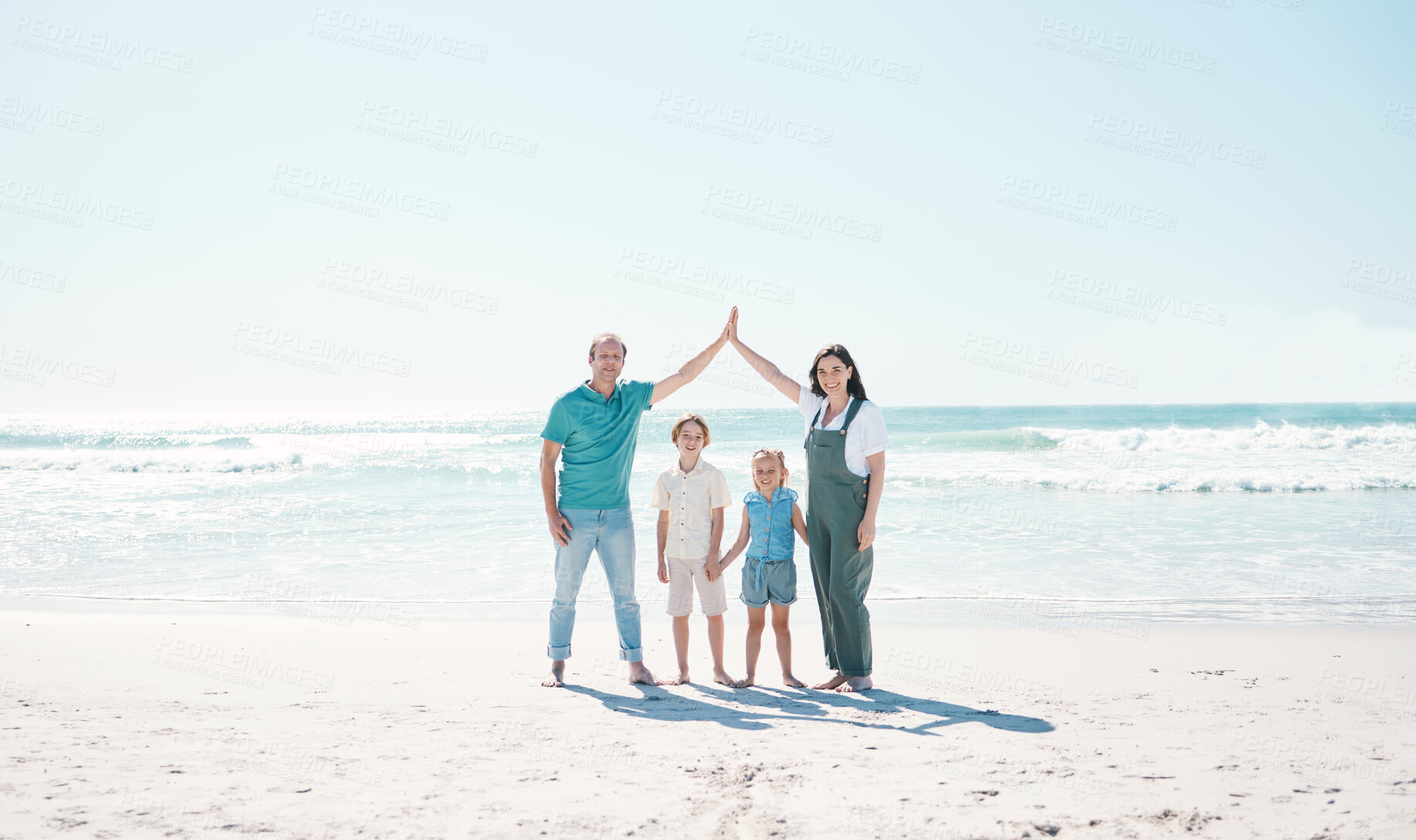 Buy stock photo Happy family portrait, hands and roof on beach for insurance, security or protection on holiday together. Father, mother or children smile on ocean coast, fun day or bonding in break at sea on mockup