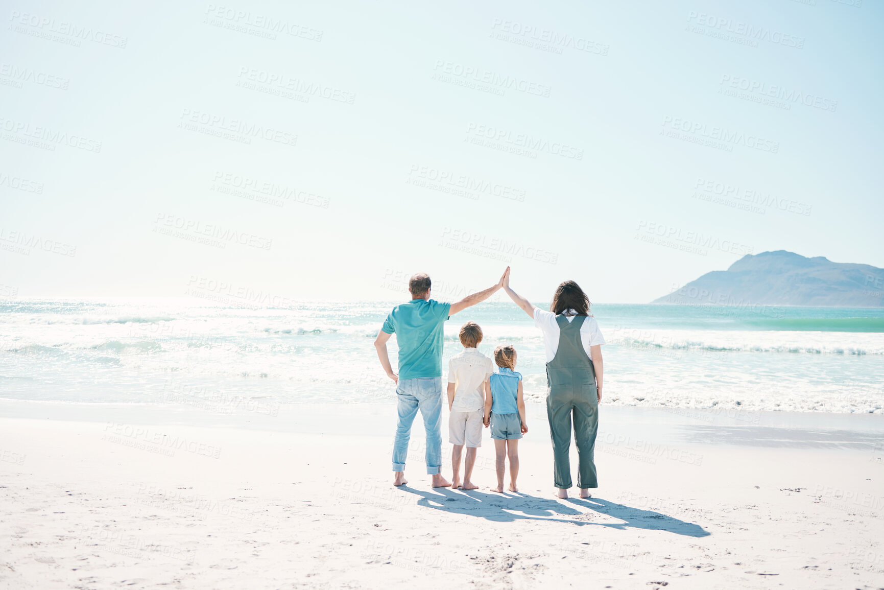 Buy stock photo Family, beach and summer vacation on mockup in travel, outdoor holiday or together on sunny day. Rear view of father, mother and children on ocean coast for fun day, bonding or break at sea in nature