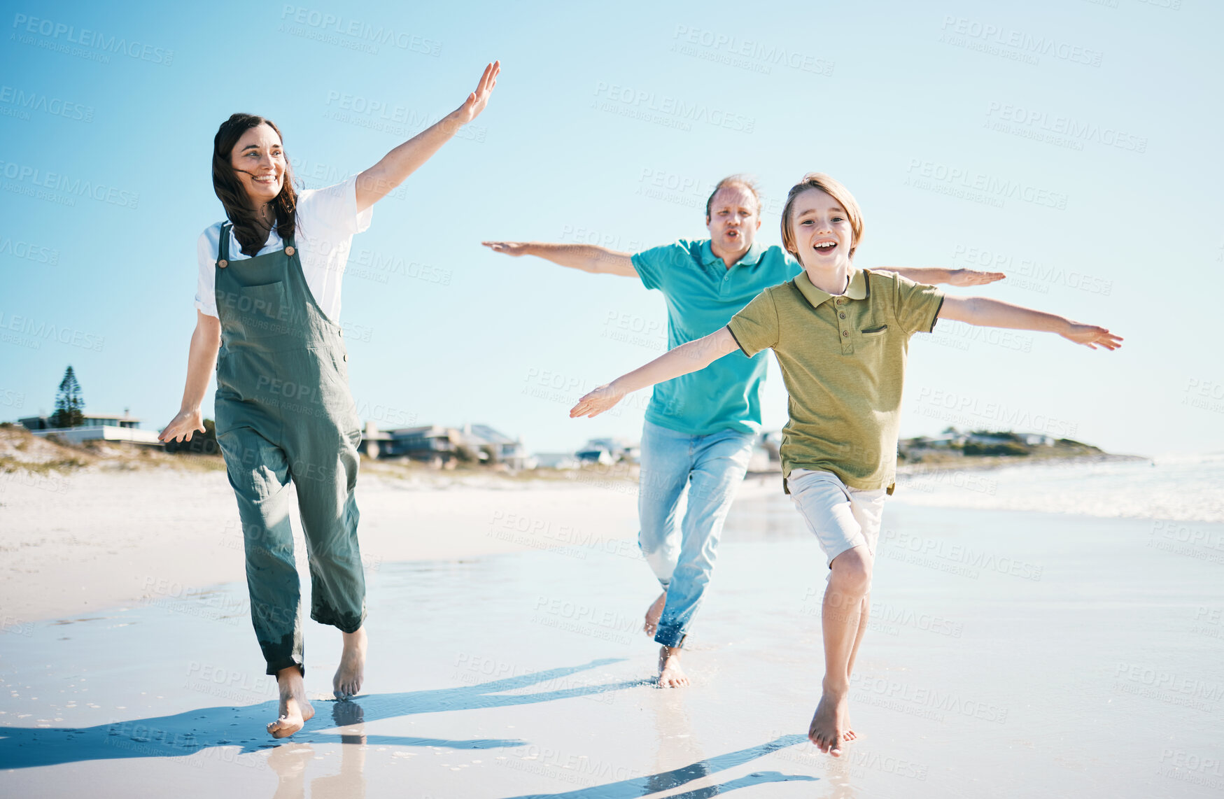 Buy stock photo Running, travel and freedom with family on beach for energy, happy and summer vacation. Love, relax and adventure with people playing on seaside holiday for health, bonding and games together