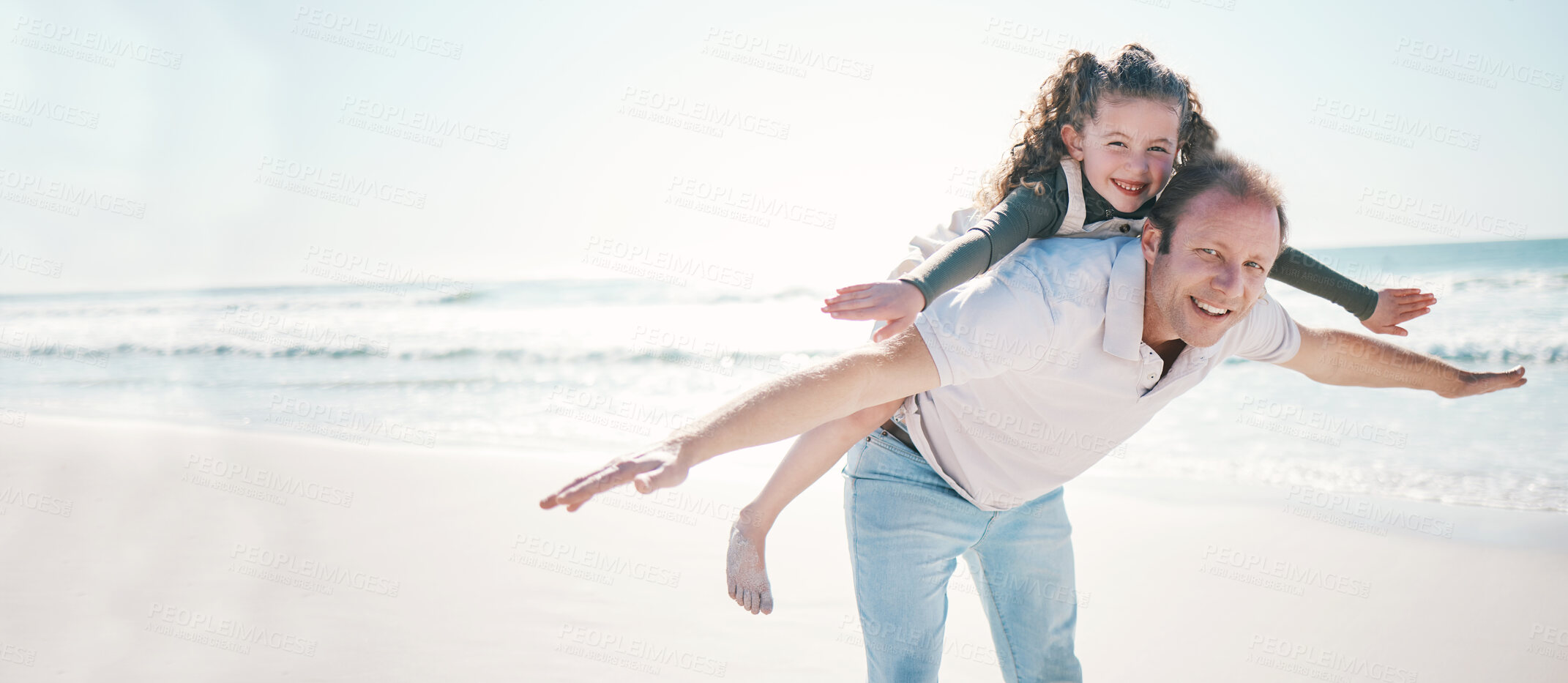 Buy stock photo Beach, flying and father with girl, portrait and summer vacation with love. smile and bonding. Happy family, parent and dad carrying child, kid and freedom with travel, seaside holiday and energy