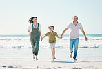 Running, happy and holding hands with family on the beach for support, summer vacation or bonding. Freedom, health and love with people on seaside holiday for adventure, trust and travel together