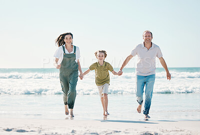 Buy stock photo Running, happy and holding hands with family on the beach for support, summer vacation or bonding. Freedom, health and love with people on seaside holiday for adventure, trust and travel together