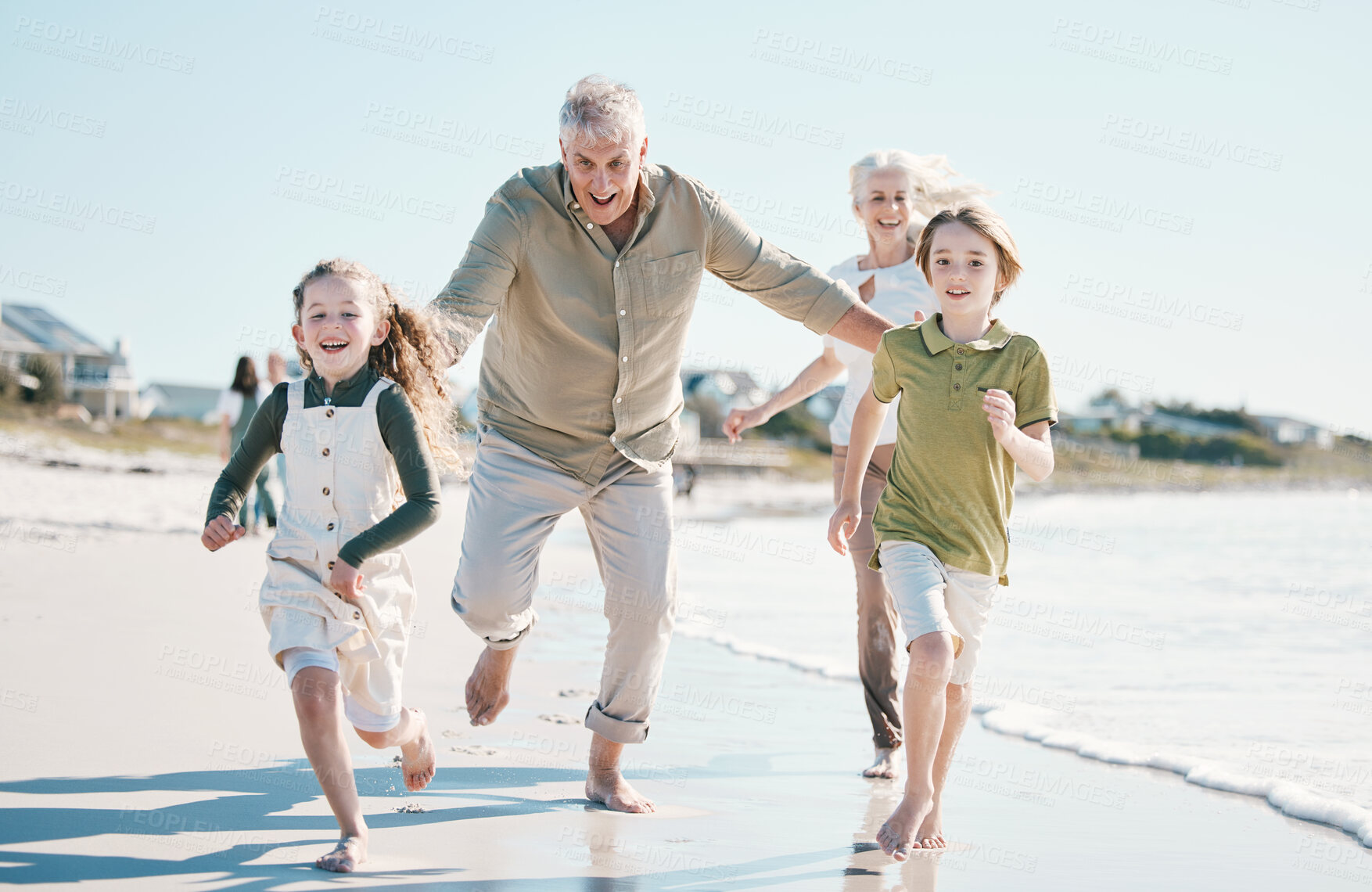 Buy stock photo Running, happy and grandparents with children on beach for energy, freedom and summer vacation. Love, relax and travel adventure with family on seaside holiday for health, bonding and games together