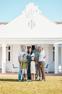 Buy stock photo Happy big family, portrait and hug in real estate, new home or property investment on outdoor grass or lawn. Parents, grandparents and kids smile for moving in, house or bonding in happiness together