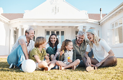 Buy stock photo Family, real estate and children in the garden of their home together for fun or bonding in summer. Smile, happy or funny with grandparents, parents and kids on a lawn in the yard of their property