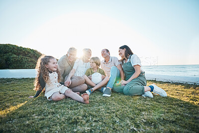 Buy stock photo Family, grandparents and children on grass by ocean for bonding, relationship and relax together. Nature, parents and happy grandmother, grandfather and kids on holiday, vacation and travel by sea