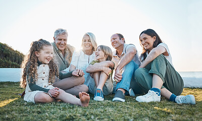 Buy stock photo Parents, grandparents and children on grass by ocean for bonding, relationship and relax together. Nature, family and happy grandmother, grandfather and kids on holiday, vacation and travel by sea